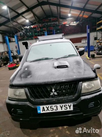 Диффузор радиатора Mitsubishi Pajero Sport K94W