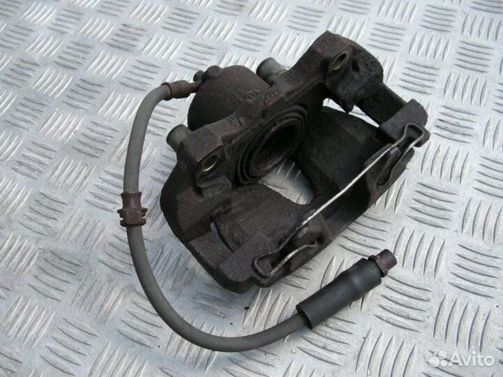 Суппорт передний Opel Astra G