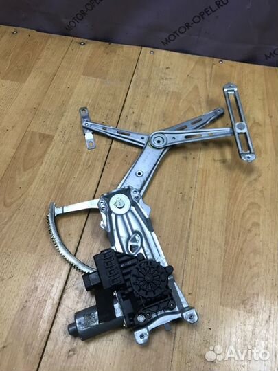 Стеклоподъемник передний левый Opel Zafira A