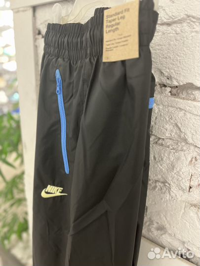 Брюки Nike Windrunner Woven Lined Pants DX0653 010