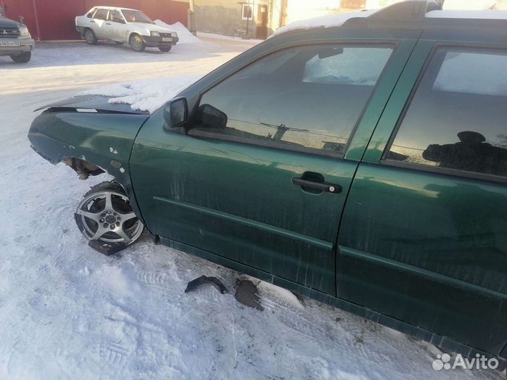 Фольксваген Поло дверь левая передняя