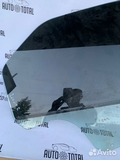 Стекло двери заднее правое Renault Logan K7J710