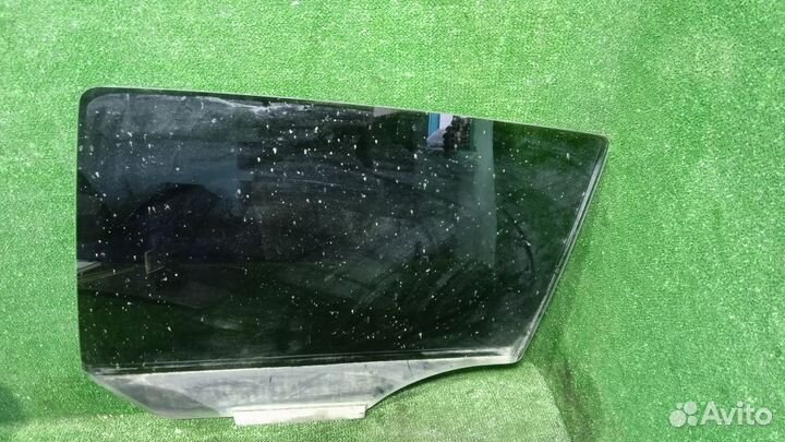Стекло двери задней левой Opel Astra