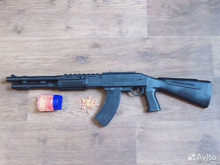 Игрушечный автомат с пульками