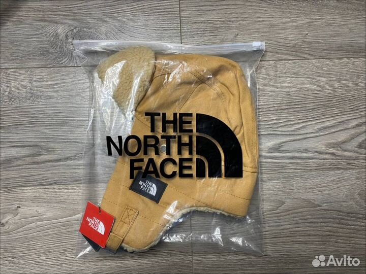 Шапка ушанка the north face бежевая