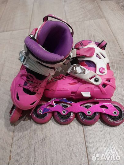 Роликовые коньки