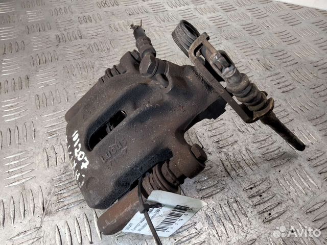 Суппорт задний левый Mitsubishi Carisma