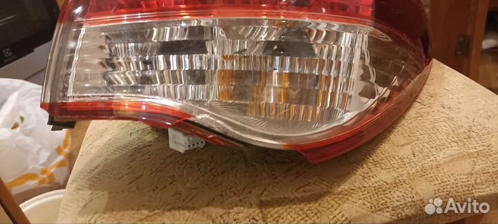 Фонарь задний Nissan almera g15