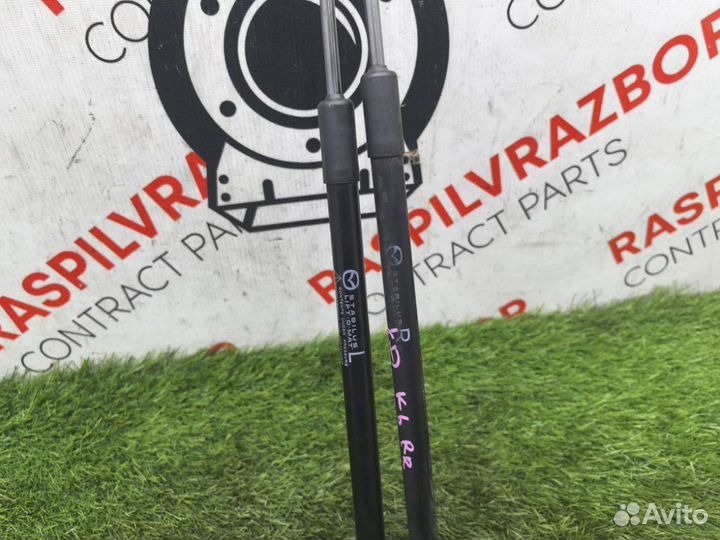 Амортизатор крышки багажника Mazda Axela blefw