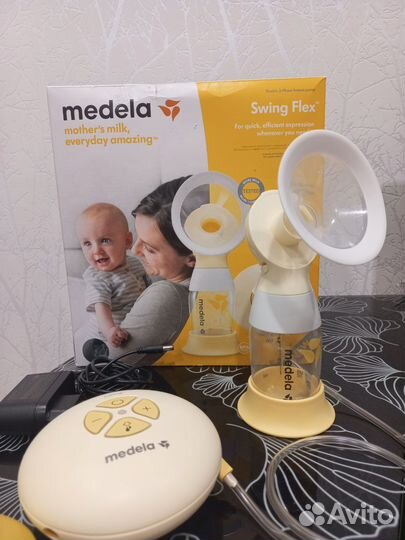 Молокоотсос medela swing электрический