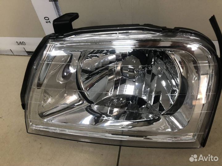 Фара левая Mitsubishi L200 K6,K7 1996-2006