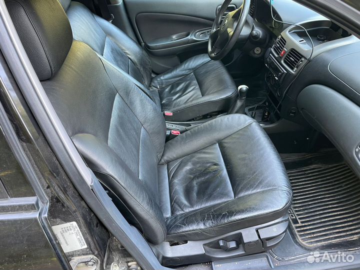 Кожаные передние сиденья