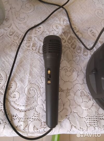 Караоке колонка блютузНовая микрофон и пульт