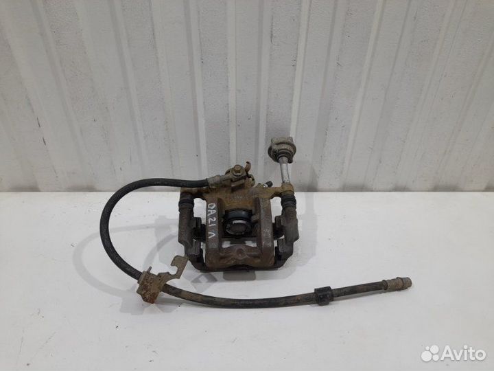 Суппорт тормозной задний левый Opel Astra J