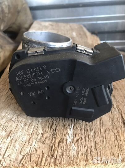 Дросельная заслонка Passat B6