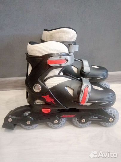 Роликовые коньки