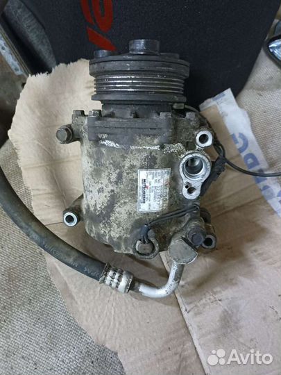 Компрессор кондиционера lancer 9