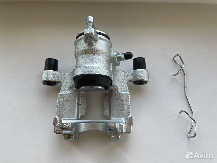 Задний тормозной суппорт Ford Kuga 2