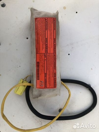 Подушка безопасности в сиденье Mazda 3