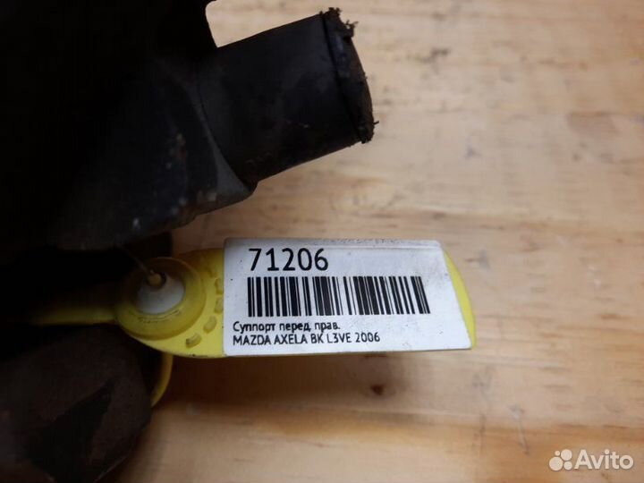 Суппорт передний правый Mazda Axela BK5P zyve 2006