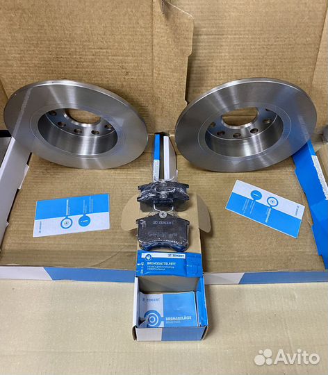 Тормозные диски и колодки задние Skoda Octavia A7