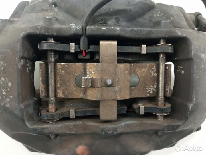 Суппорт передний левый Volkswagen Touareg II (2010—2014)