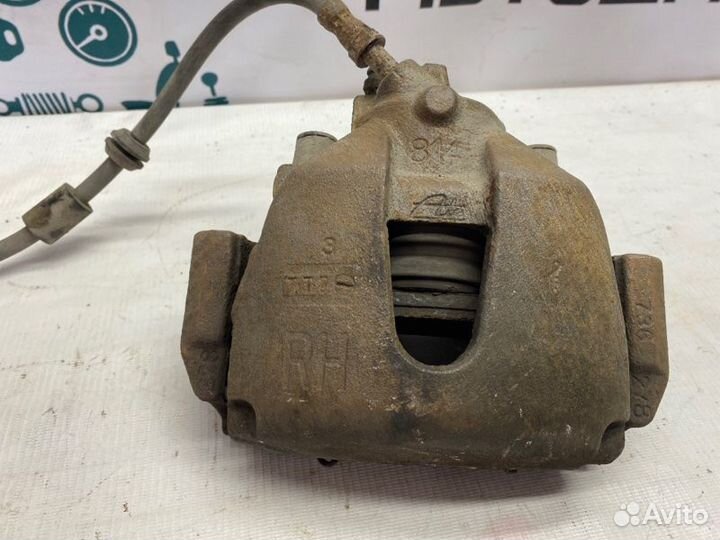 Суппорт тормозной передний правый Ford Focus седан