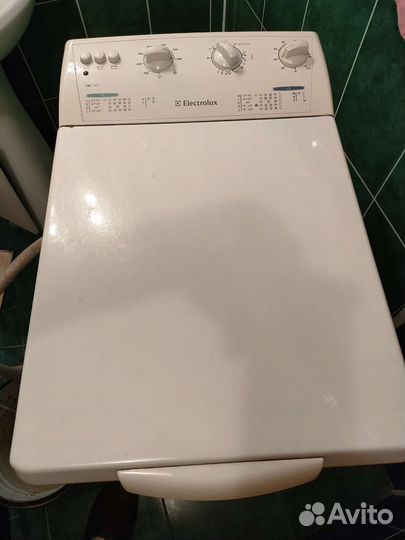 Стиральная машина с вертикальной загрузкой