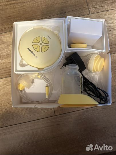 Молокоотсос medela