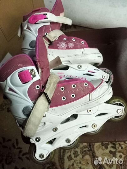 Роликовые коньки