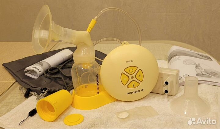 Молокоотсос medela swing