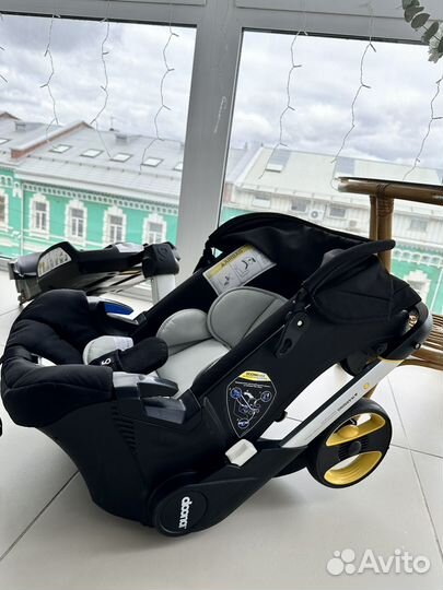 Автокресло doona + база doona isofix