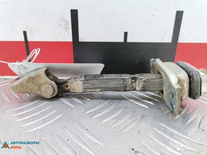 Ограничитель открывания двери Mitsubishi L200 3