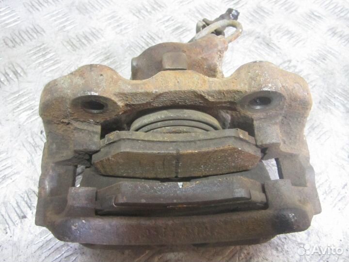 Суппорт тормозной передний Volkswagen Passat B4