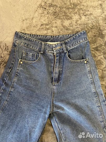 Джинсы клеш