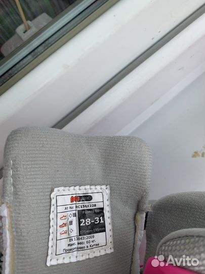 Роликовые коньки