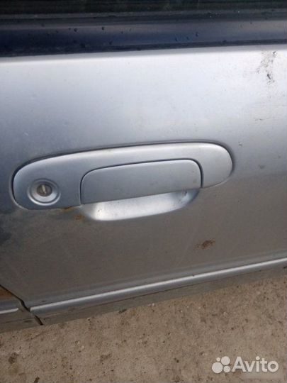 Ручка двери наружная передняя Mazda 323 BJ