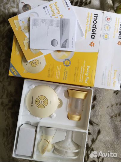 Молокоотсос medela swing flex электрический