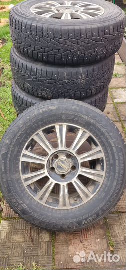 Резина шипованная Nokian 215/70R16 100T с дисками