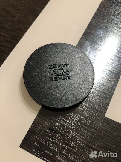 Крышка объектива фотоаппарата