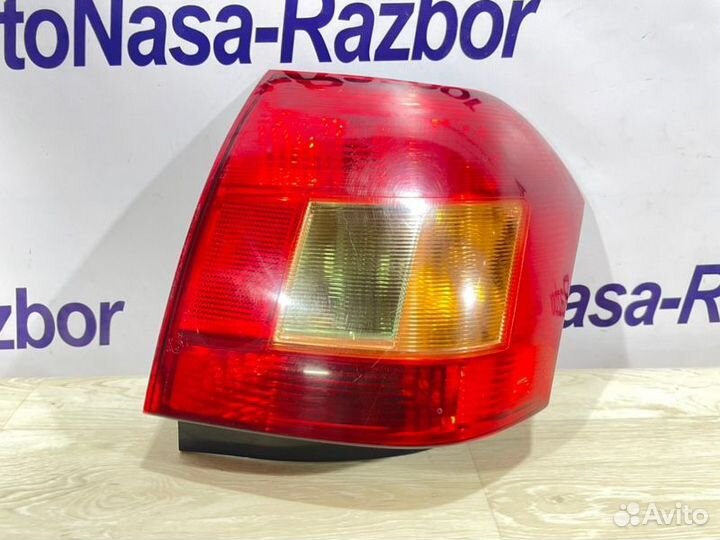 Фонарь левый Toyota Corolla E120 1.4 4ZZ 2001-2007