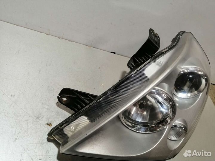 Фара левая Ssang Yong Rexton 2001-2007г