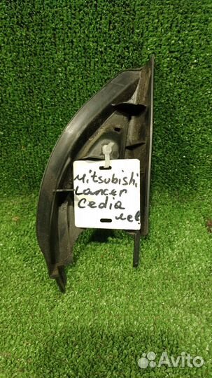 Заглушка левой двери mitsubishi lancer cedia