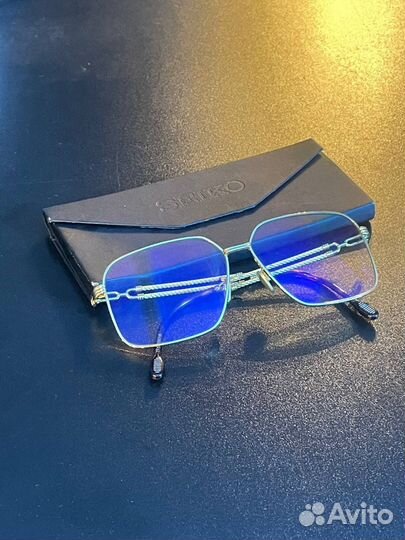 Золотые очки Seiko с адаптивными линзами