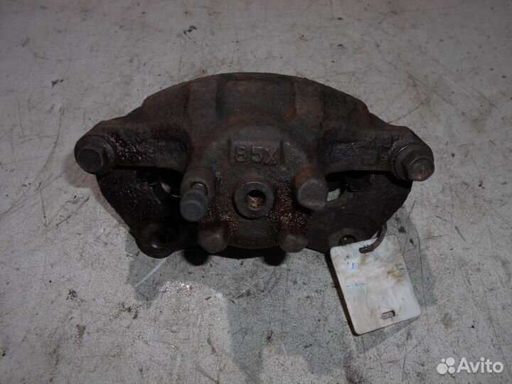 Суппорт передний левый Mitsubishi Lancer 10