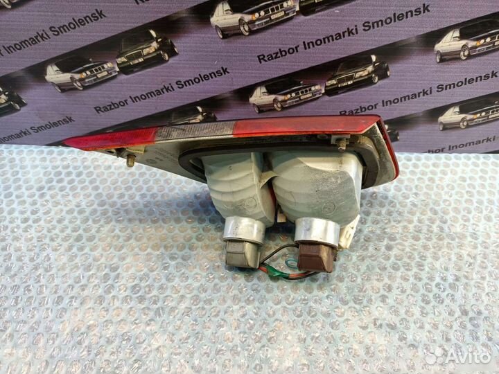 Фонарь задний левый Mitsubishi Carisma