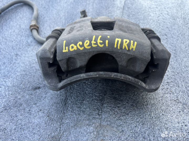 Тормозной суппорт передний Chevrolet Lacetti