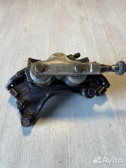 Суппорт передний правый Chevrolet Niva