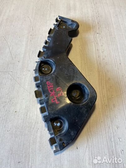 Кронштейн бампера задний левый Renault Duster