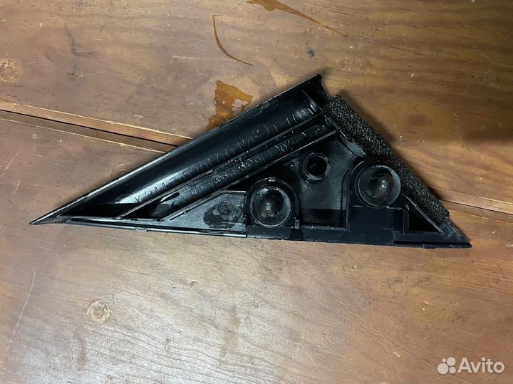 Накладка (уголок) зеркала левый Mazda Demio DW